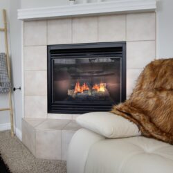 A,View,Of,A,Fireplace,In,A,Living,Room,Setting.