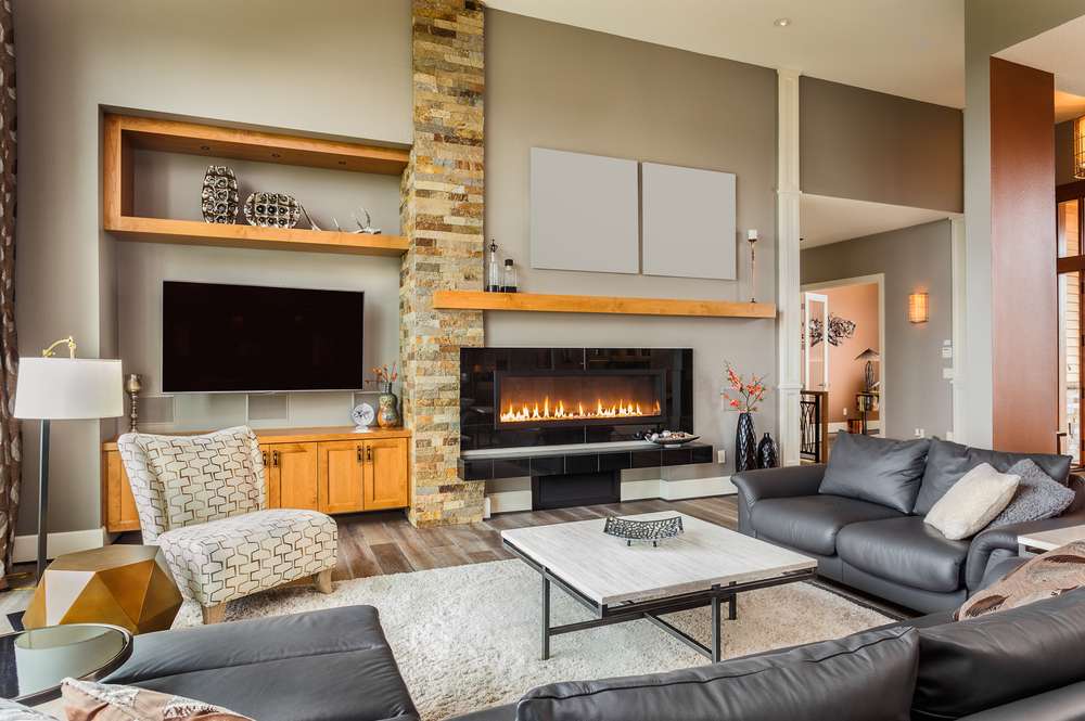 Furnished,Living,Room,In,Luxury,Home,With,Roaring,Fireplace