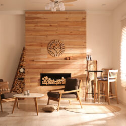Decorative,Fireplace,With,Stacked,Wood,In,Cozy,Living,Room,Interior